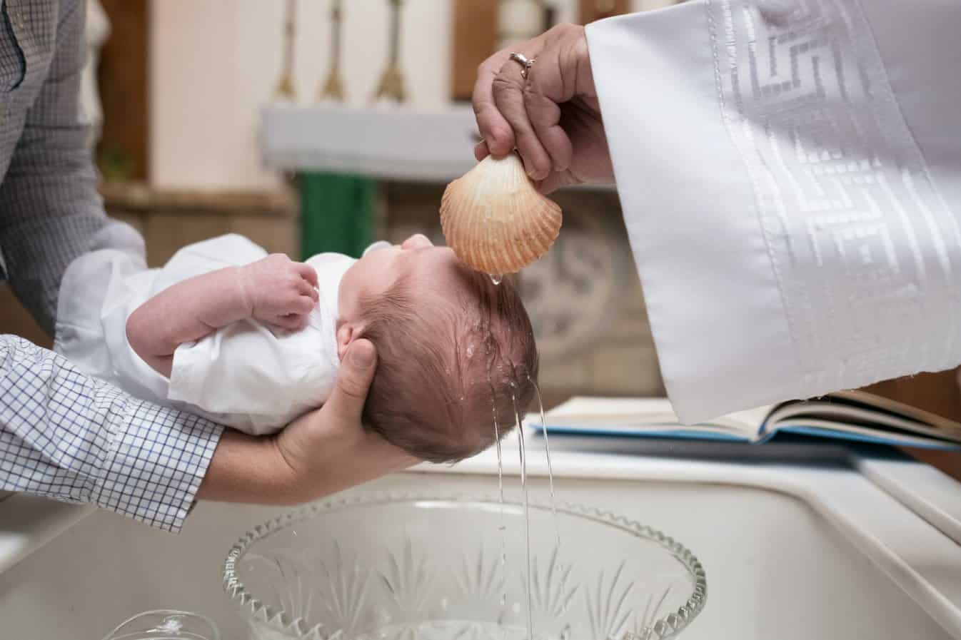 A Christian baby getting baptized in a church